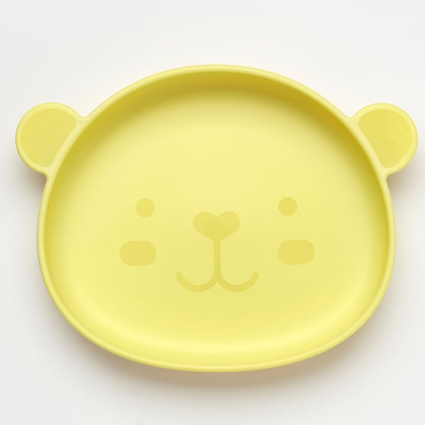 Yellow childs plate shaped like a bears head with ears as handles. Made of durable, bpa-free plastic. Raised edges keep food centred.