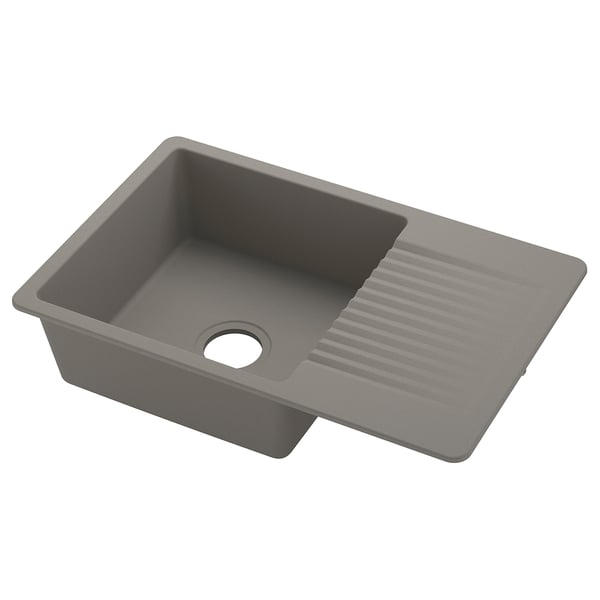 Grey, rectangular sink; single basin; smooth, quartz composite; modern design.