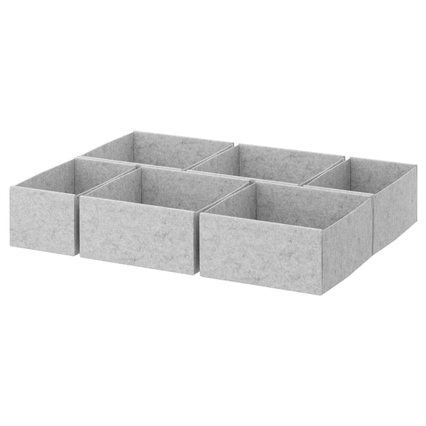 Four KOMPLEMENT drawer organisers, light grey, rectangular, made from 100% polyester felt.
