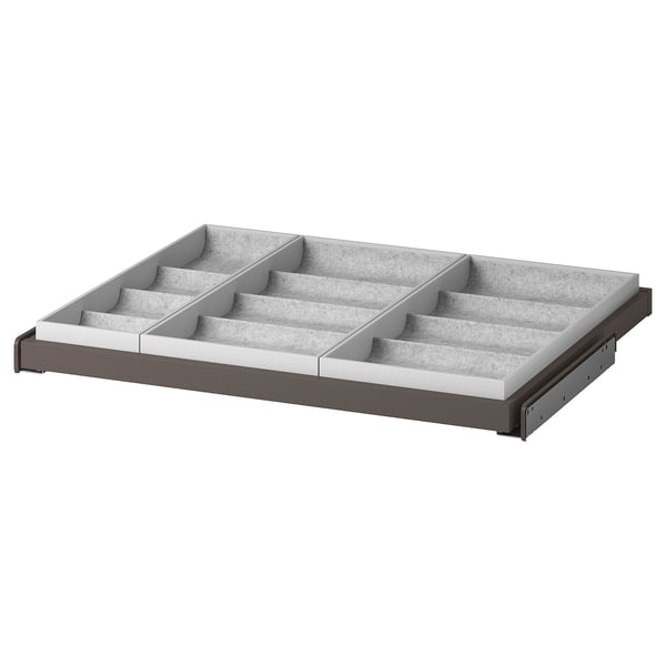 An IKEA KOMPLEMENT pull-out organiser tray in grey for storing accessories.
