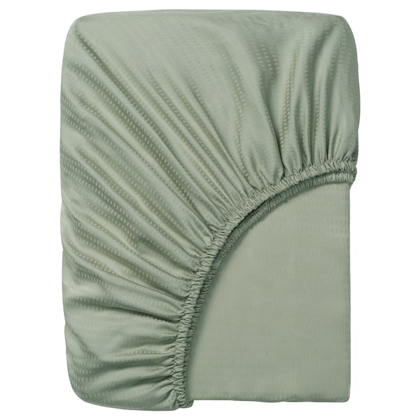 A green LÄKEVÄNDEROT fitted sheet, made of 100% lyocell, with a subtle patterned design, rectangular and fitted for mattresses up to 26 cm thick.