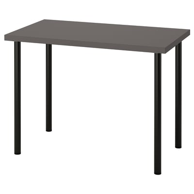 Modern desk with rectangular grey tabletop and sleek black legs.