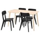 Modern dining set with light birchwood table and four black chairs, award-winning design.