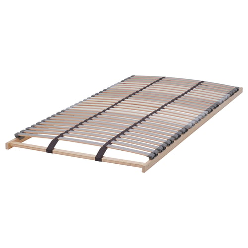 A LÖNSET slatted bed base in light wood. It curved, spaced slats for ventilation and support, with comfort zones for spine alignment.