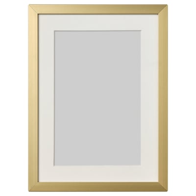 Golden picture frame with white mat, rectangular design, metal edge.