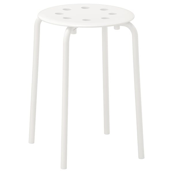 A white MARIUS stool, round, with metal legs and a perforated seat.