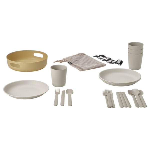 Picnic set including: beige plates, cups, cutlery, serving tray, mesh bag. Lightweight, durable, easy to store.