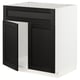 Modern black stained ash and white kitchen cabinet with bevelled edges.