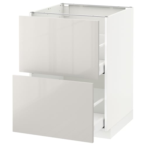 Modern white kitchen cabinet with high-gloss finish and drawer.