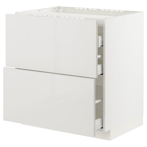White METOD kitchen cabinet with smooth grey drawers and glossy finish.