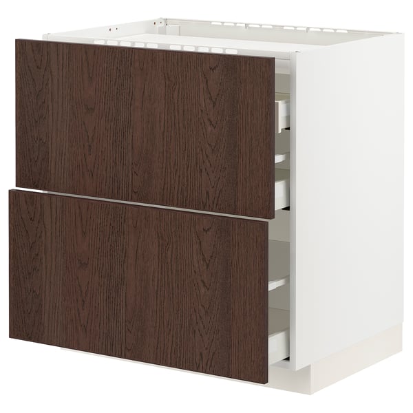 White & dark brown kitchen cabinet with sleek wooden handles and smooth drawers.