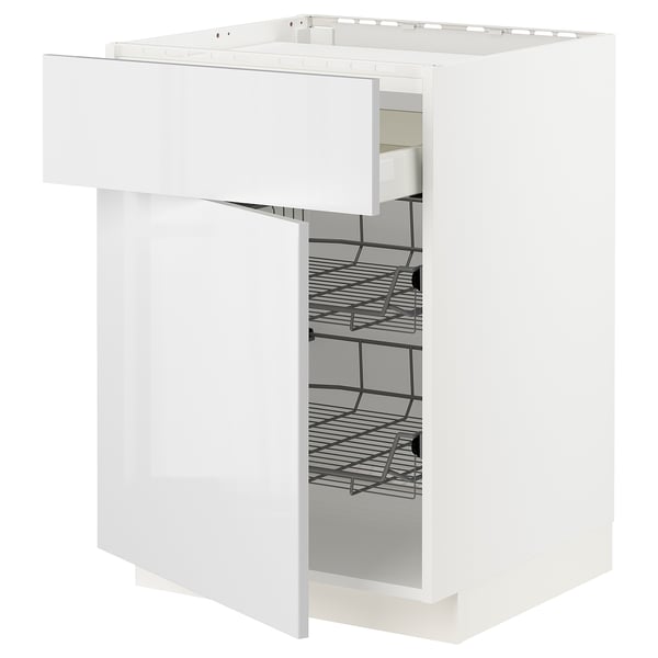 White kitchen cabinet with pull-out wire basket.