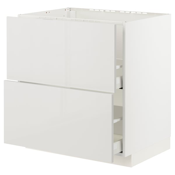 A white METOD kitchen cabinet with a smooth, modern design and a built-in drawer system.