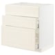 Off-white METOD kitchen cabinet with bevelled edges, three drawers.