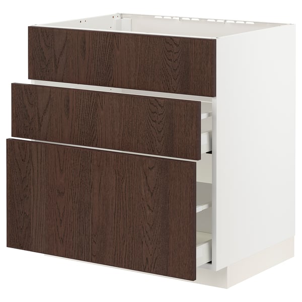 Modern kitchen unit, white with dark brown drawers, sleek design, wooden edges.
