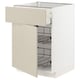 A white METOD kitchen cabinet with beige havstorp drawers and three wire racks.