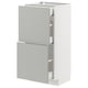 This image shows a white and light grey ikea METOD kitchen cabinet with two drawers and a door in a minimalist design with a clean look.