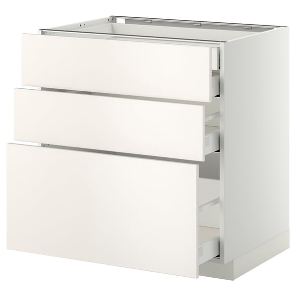 White METOD kitchen cabinet with three smooth drawers, sleek and modern design.