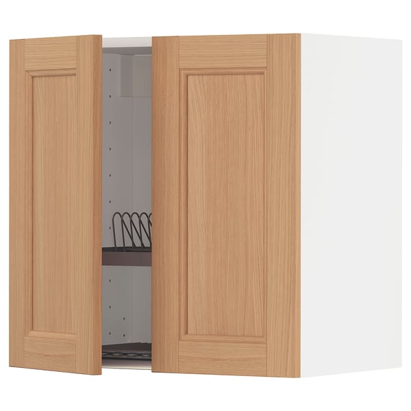 A wooden kitchen cabinet set with light oak doors open, revealing an interior shelf and a dish rack.