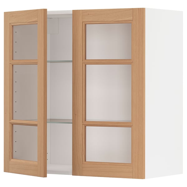 Light wooden-framed kitchen cabinet with frosted glass doors.