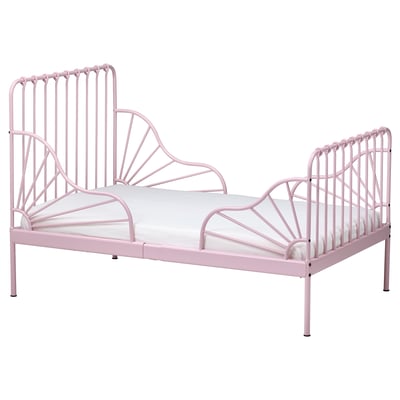A pink MINNEN extendable toddler bed with a heart-shaped metal frame and slatted base, designed for children.