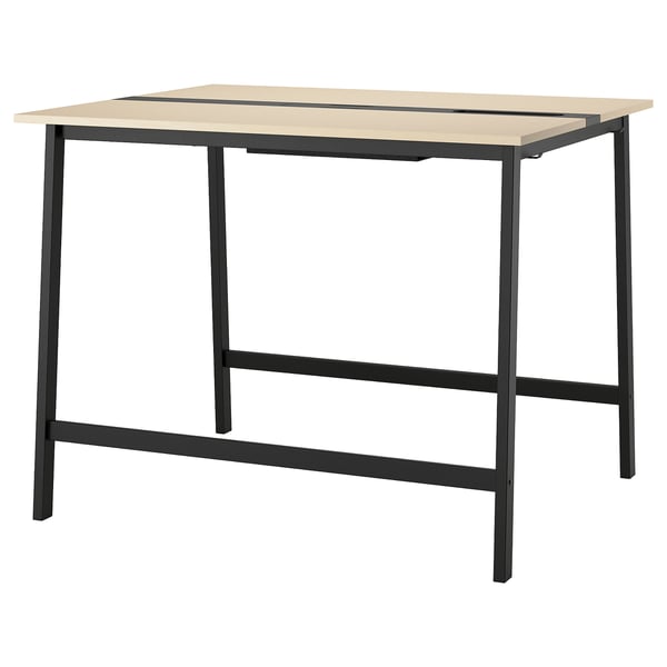 An MITTZON high conference table with a beige top and black metal legs. It includes a footrest for comfort and has a modern, minimalist design.