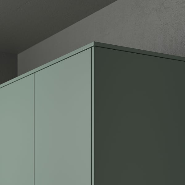 Modern grey-green kitchen cabinets with lighting