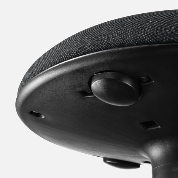 Close-up of ergonomic office chairs height adjuster, showcasing quality materials and design.