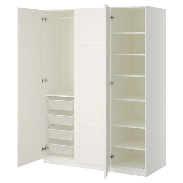 White PAX wardrobe, open doors revealing shelves and mesh baskets, minimalist design.