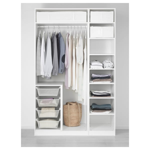 White PAX wardrobe displaying clothes on hangers and shelves, with mesh storage baskets.