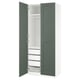 An open white and teal green PAX wardrobe with drawers and shelves.