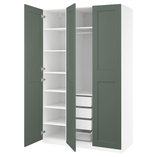 Green PAX wardrobe, open, white shelves, mesh basket.