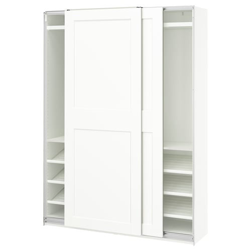 A white PAX wardrobe with sliding doors and internal shelves.