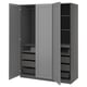 A gray ikea PAX wardrobe with open doors, featuring shelves, drawers, and compartments.
