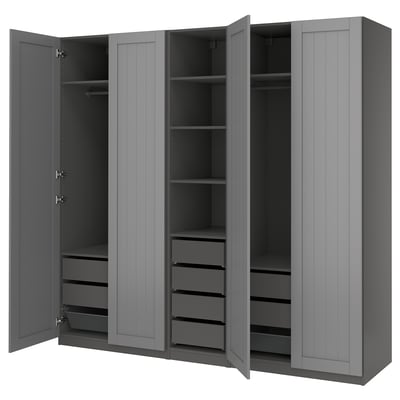 A grey PAX wardrobe with multiple storage compartments including shelves and drawers.