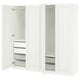 A white PAX wardrobe with open doors, revealing storage compartments and mesh drawers inside.