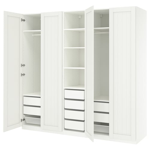 A white ikea PAX wardrobe with adjustable shelves and drawers, featuring a sleek design.