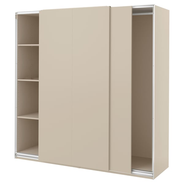 Modern beige PAX closet with sliding doors and interior shelves.