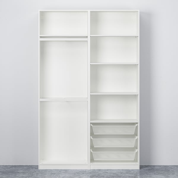 A tall, white wardrobe with sliding doors, showcasing wire mesh baskets at the bottom. The wardrobe stands against a plain wall.