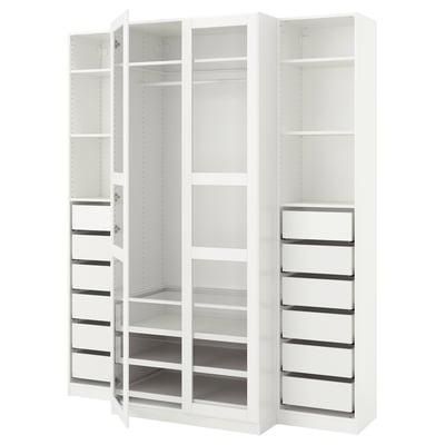 A white PAX wardrobe with multiple shelves and drawers, offering organised storage space.