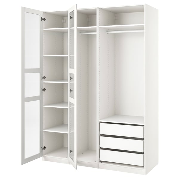 White PAX wardrobe with open doors showing shelves and drawer unit.