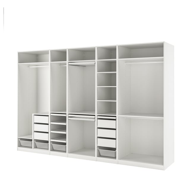 White PAX storage system with open shelves, drawers, and hanging space.