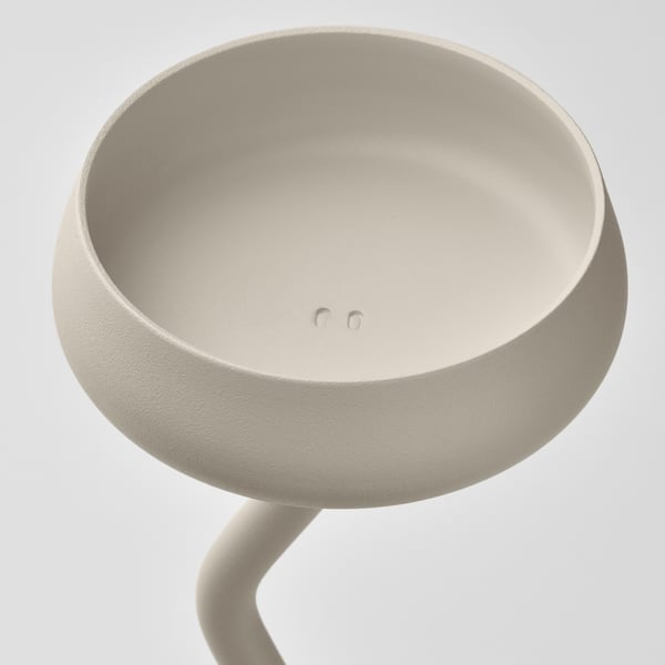 Modern candlestick with smooth, white, undulating stem and wide, shallow bowl. High-quality, elegant design.