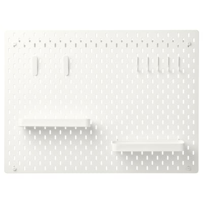 SKÅDIS white pegboard with hooks and shelves for organising.