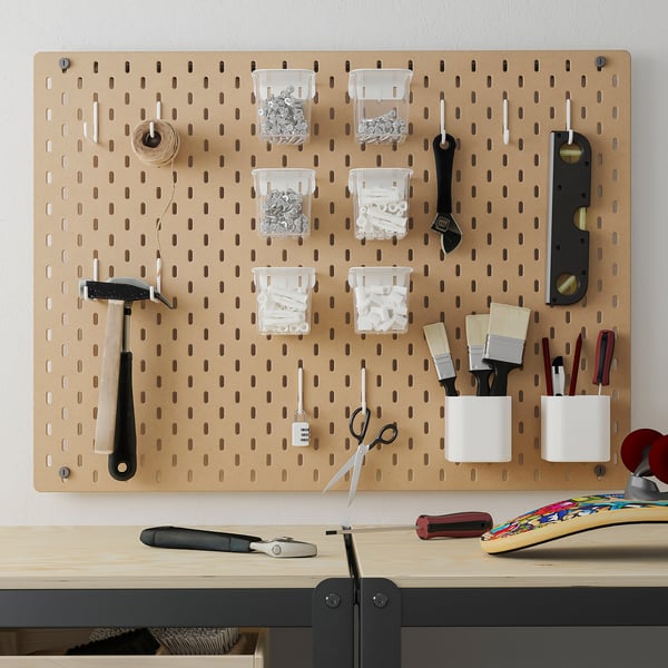 SKÅDIS pegboard, wood, holds tools, small parts, clear containers, black tools, scissors, white containers.