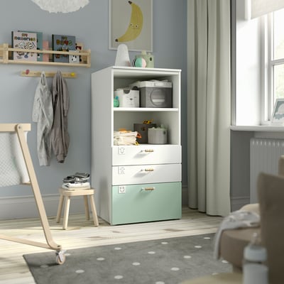 Kids room with SMÅSTAD storage, toys, books, and natural light.