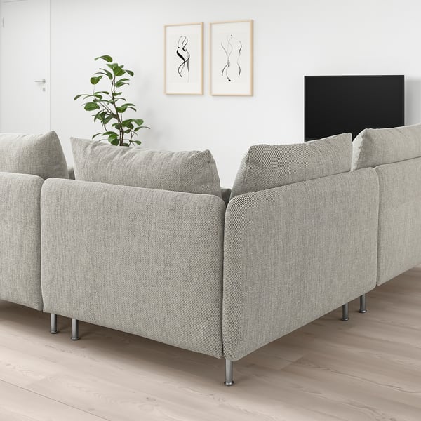 Grey ikea SÖDERHAMN sectional sofa in modern living room with tv & plant.
