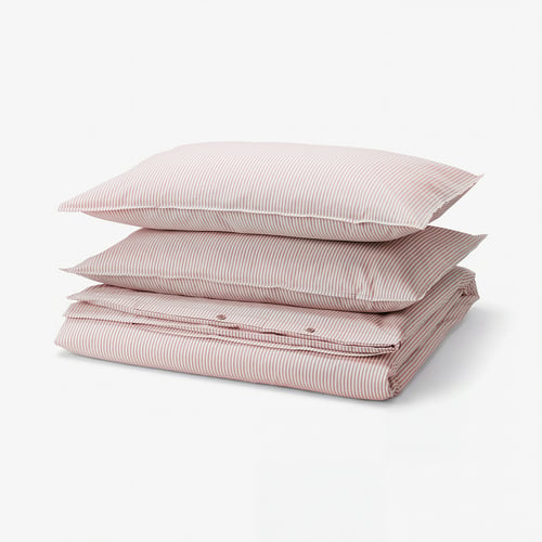 A stack of red and white striped cotton pillows and duvet.