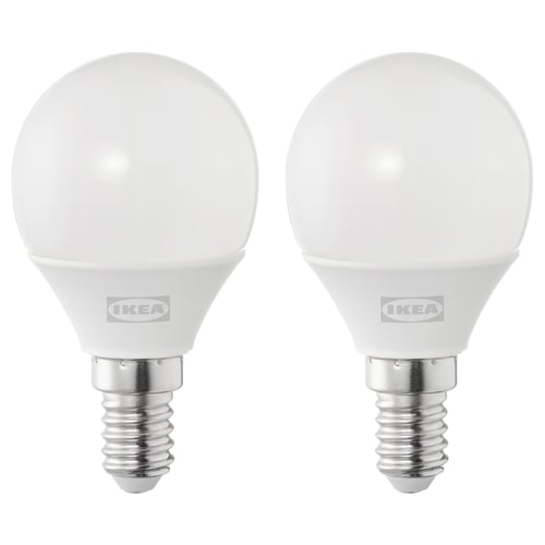 Two round, white led light bulbs by IKEA, made of durable plastic, standing upright on a white background.