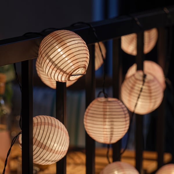 Lanterns on black frame, warm festive